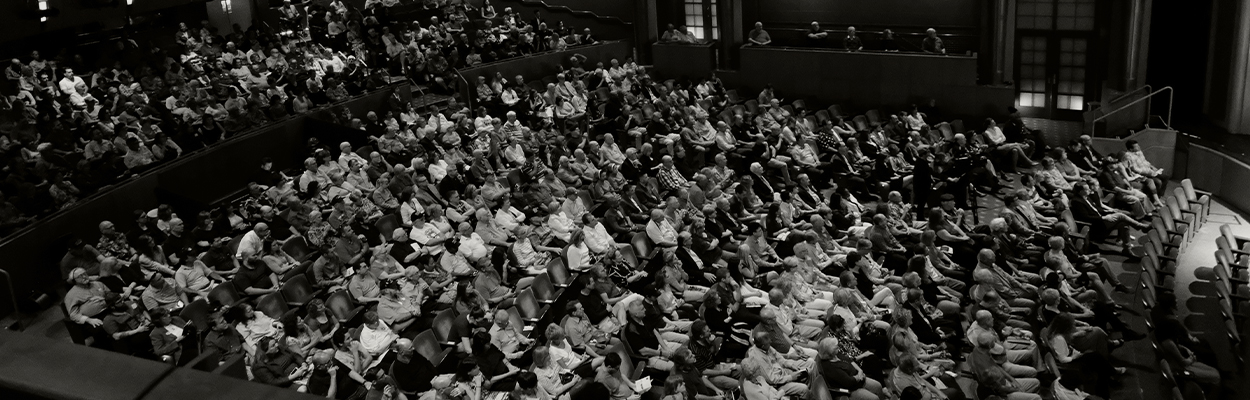 Crowd of patrons in the Anheuser-Busch Performance Hall